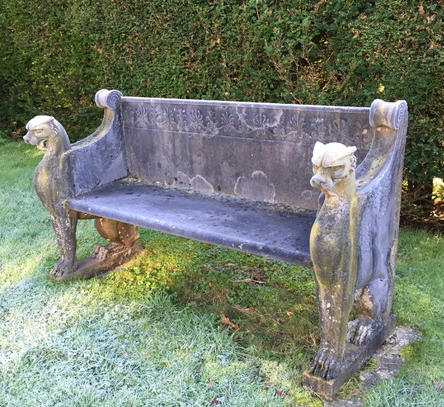 An Empire style reconstituted stone garden bench, 5ft 5.5in.